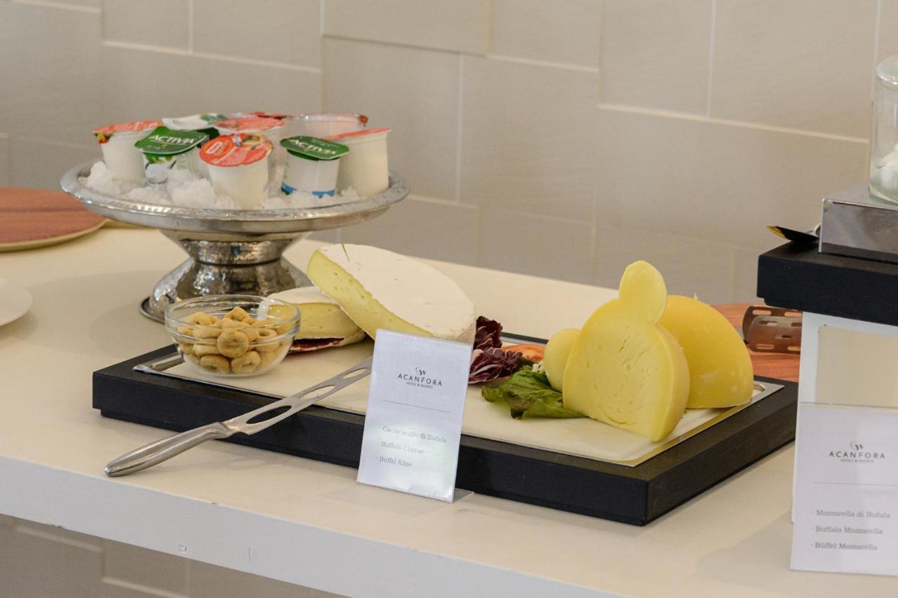 麦可帕埃斯图姆酒店 外观 照片 A selection of cheese and fruit at a buffet